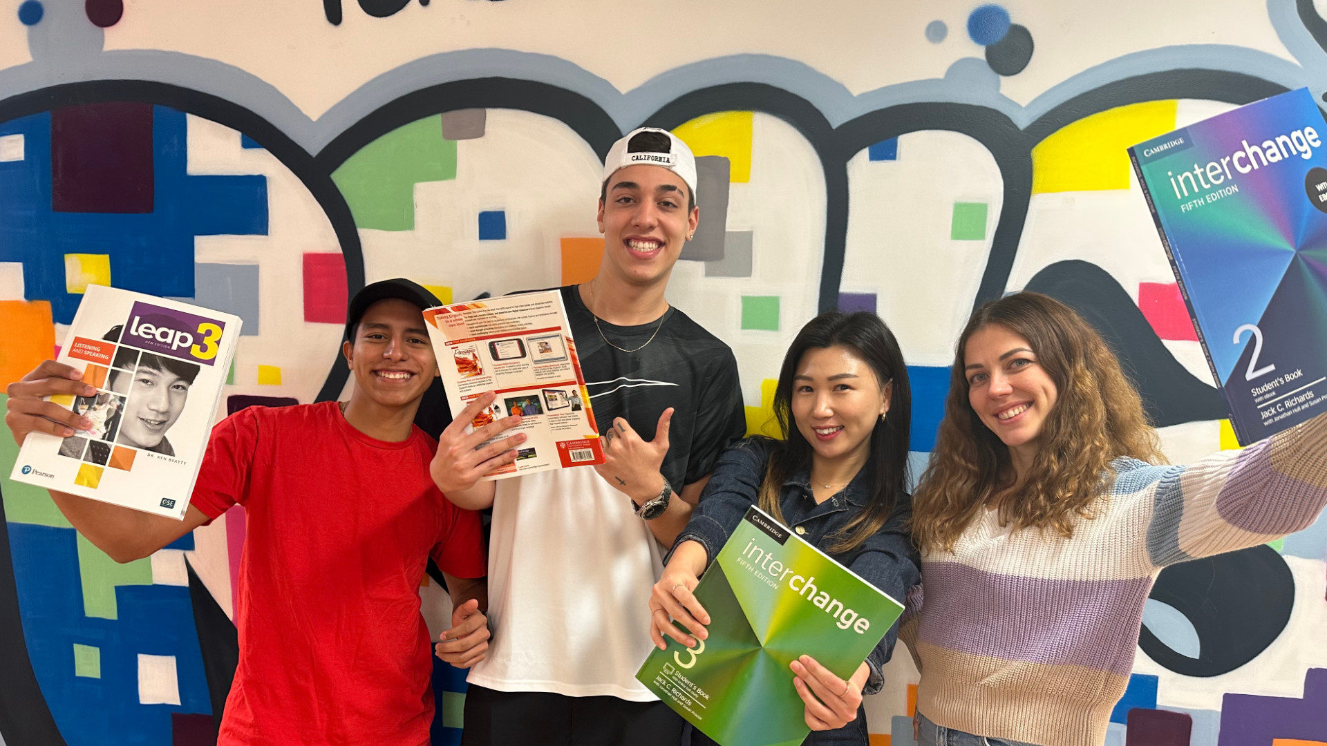 Students holding a book